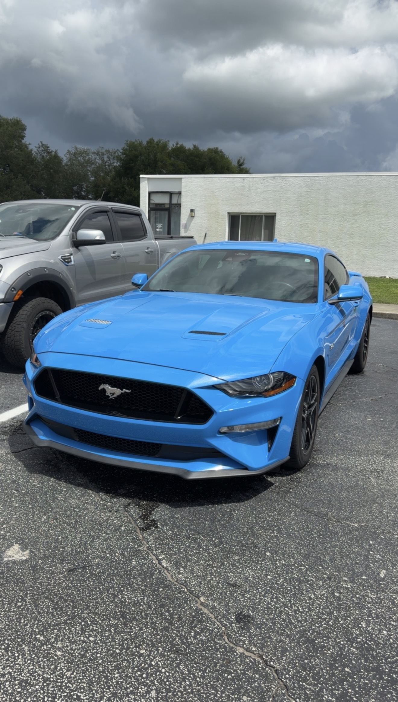 Blue Ford Mustang after exterior detailing
