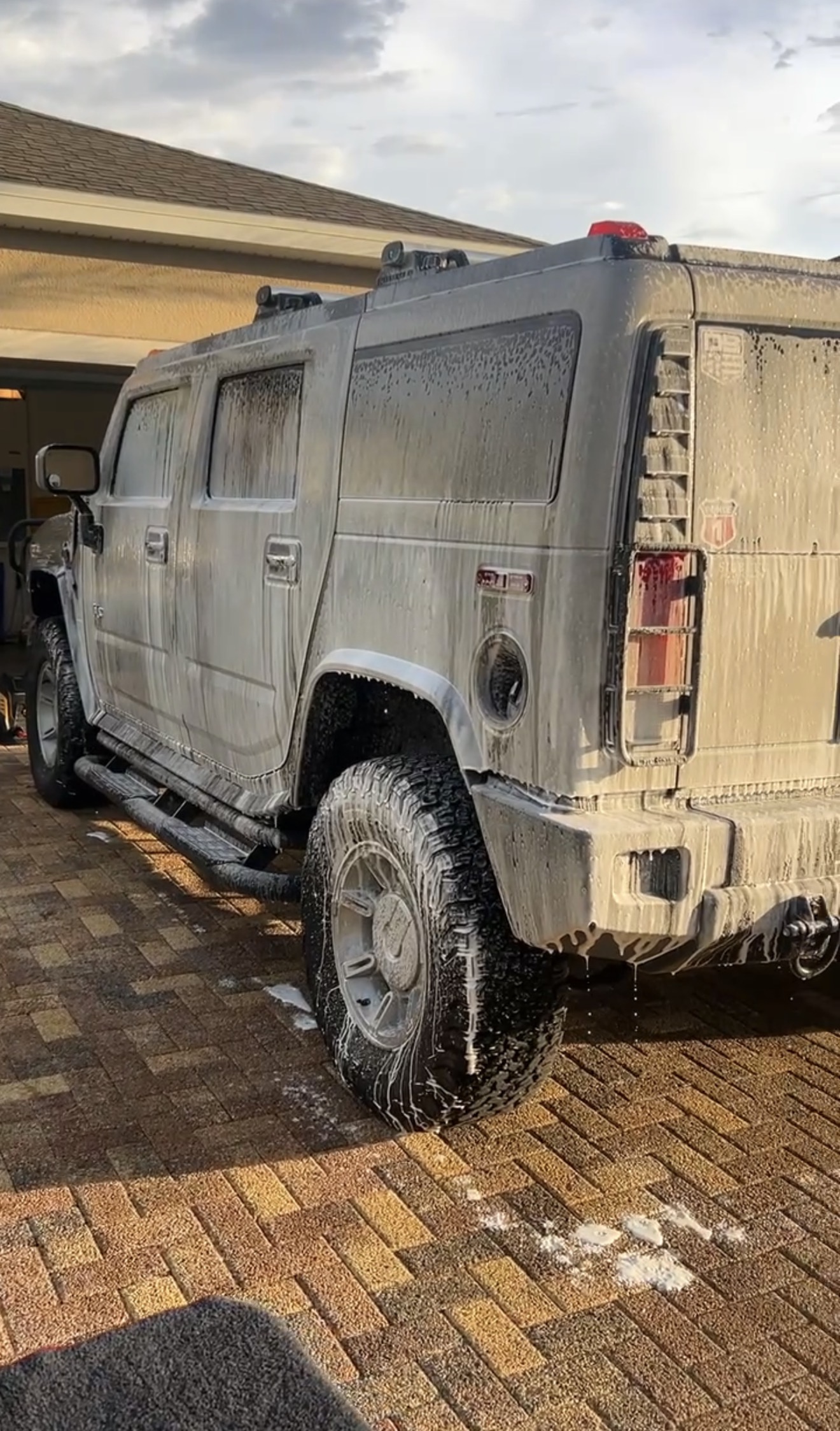 Hummer covered in foam during an Emerald Mobile Detailing wash
