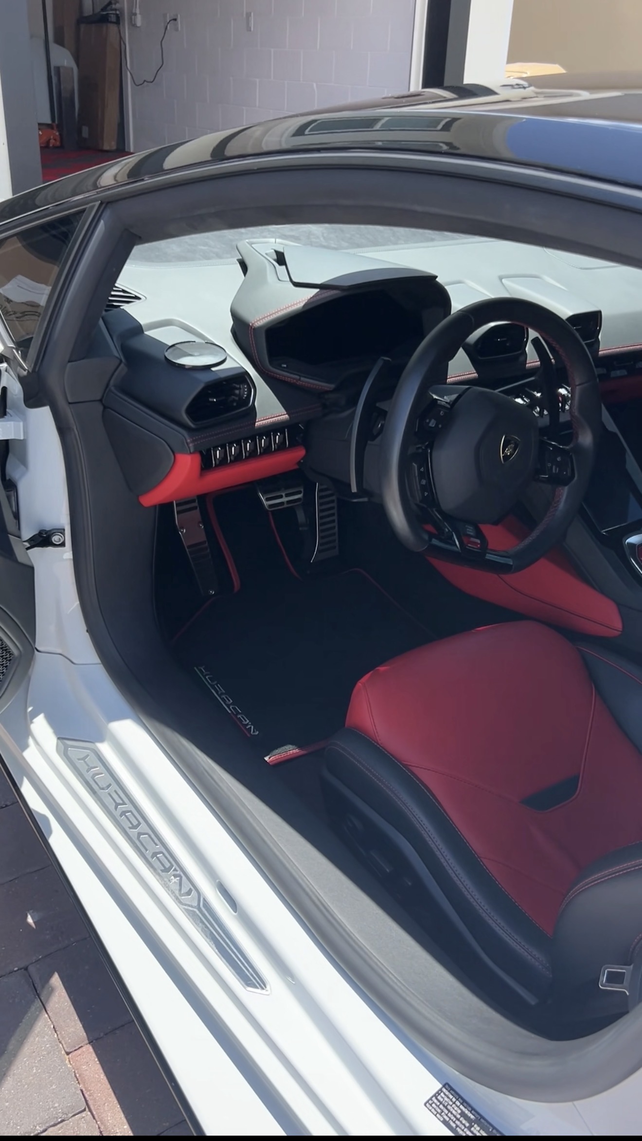 Detailed red and black Lamborghini interior
